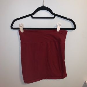 Tight-fitting, maroon pencil skirt